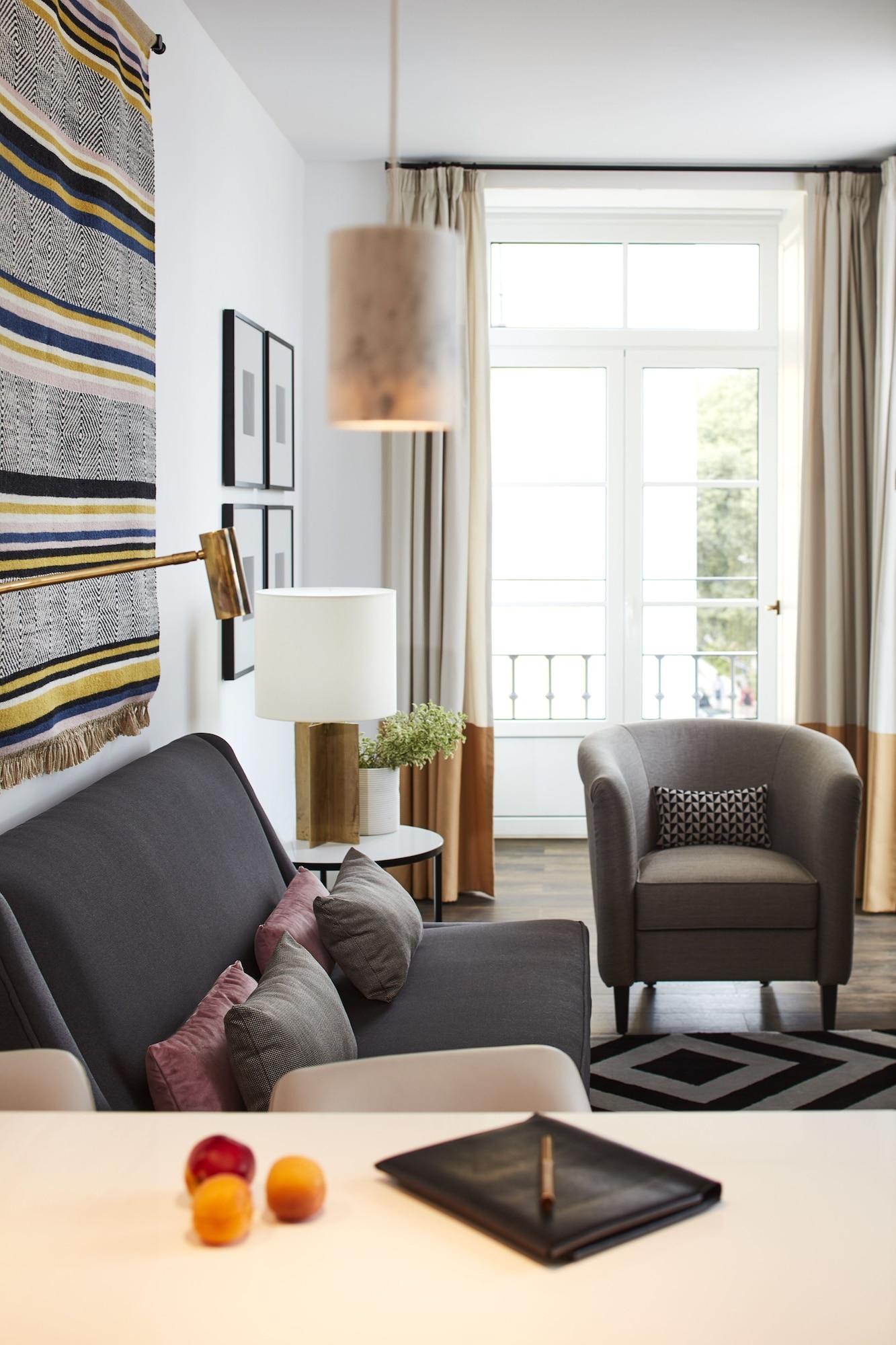 The Lumiares Hotel & Spa - Small Luxury Hotels Of The World Lisboa Екстериор снимка A living room with a sofa, armchair, and floor lamp